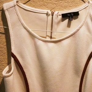 Adorable faux leather and spandex polyester blouse